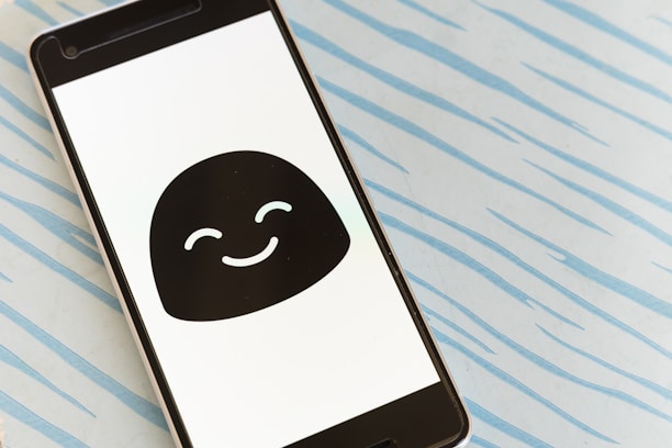 A close-up of a smartphone displaying a positive review notification.