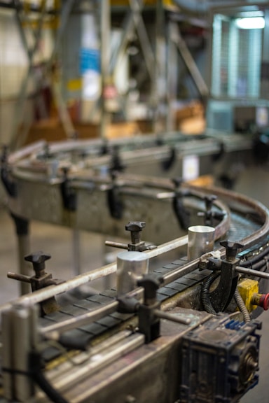 shallow focus photography of brown steel pipe