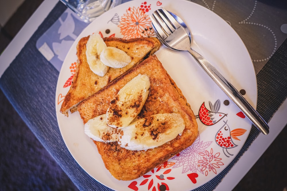 toasted bread with sliced of bread on white ceramic plate