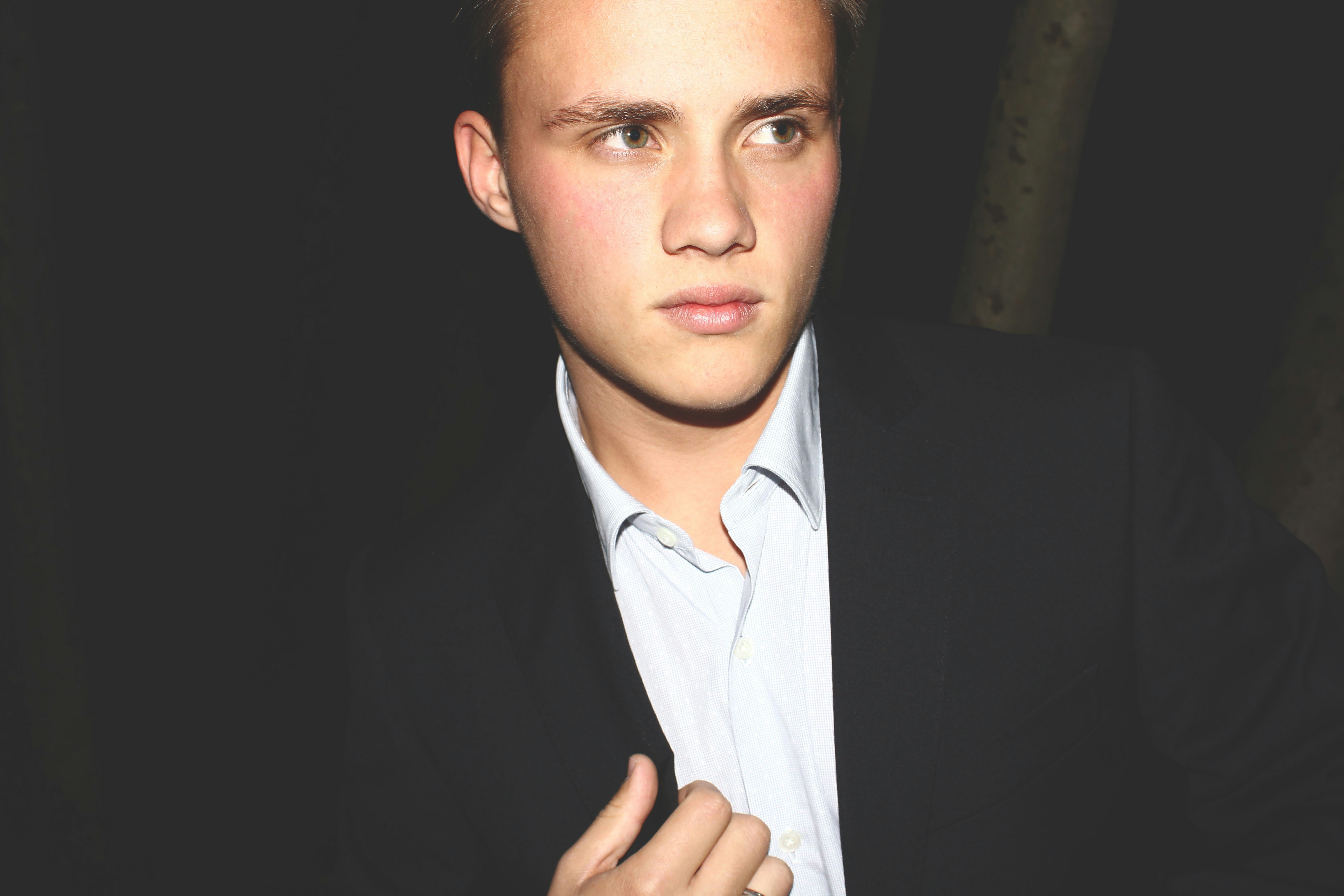 Man in black suit jacket