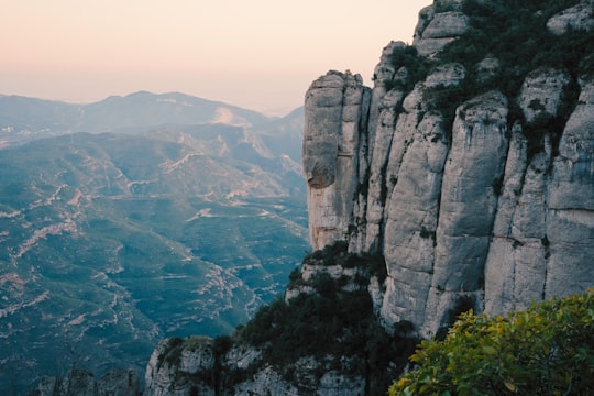 aerial view of green and brown mountains during daytime in Montserrat Spain