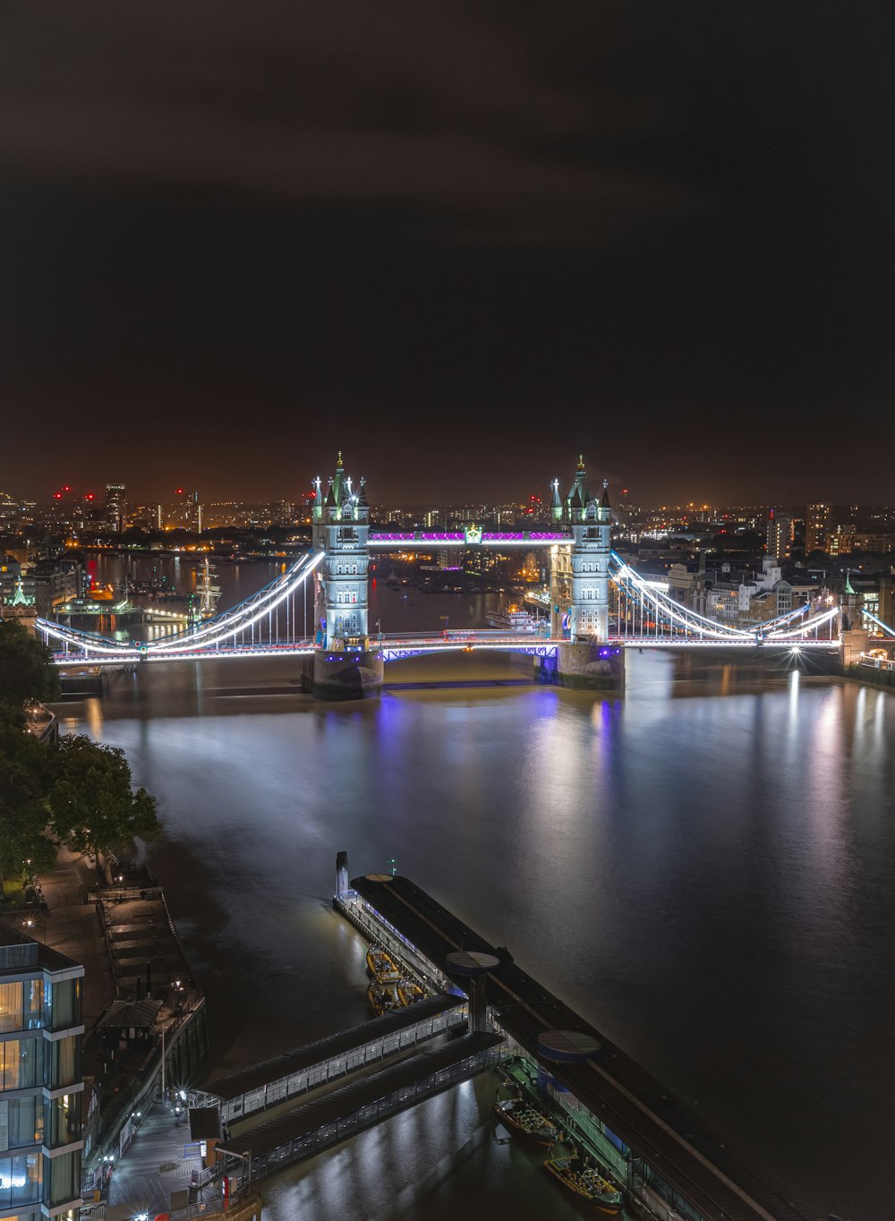 bridge with lights during night time