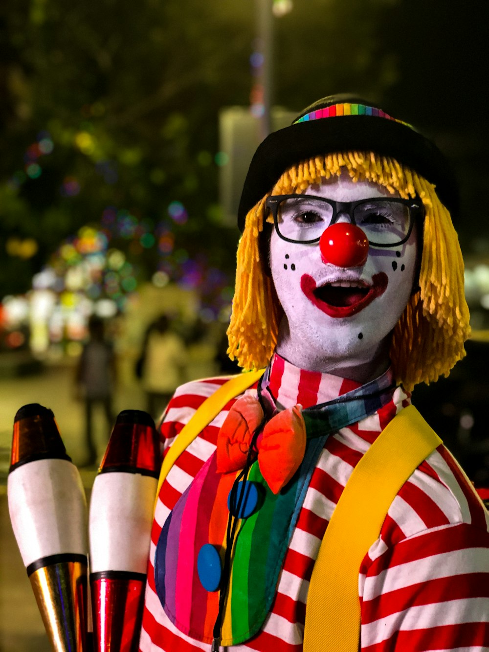 clown in red blue and yellow plaid shirt