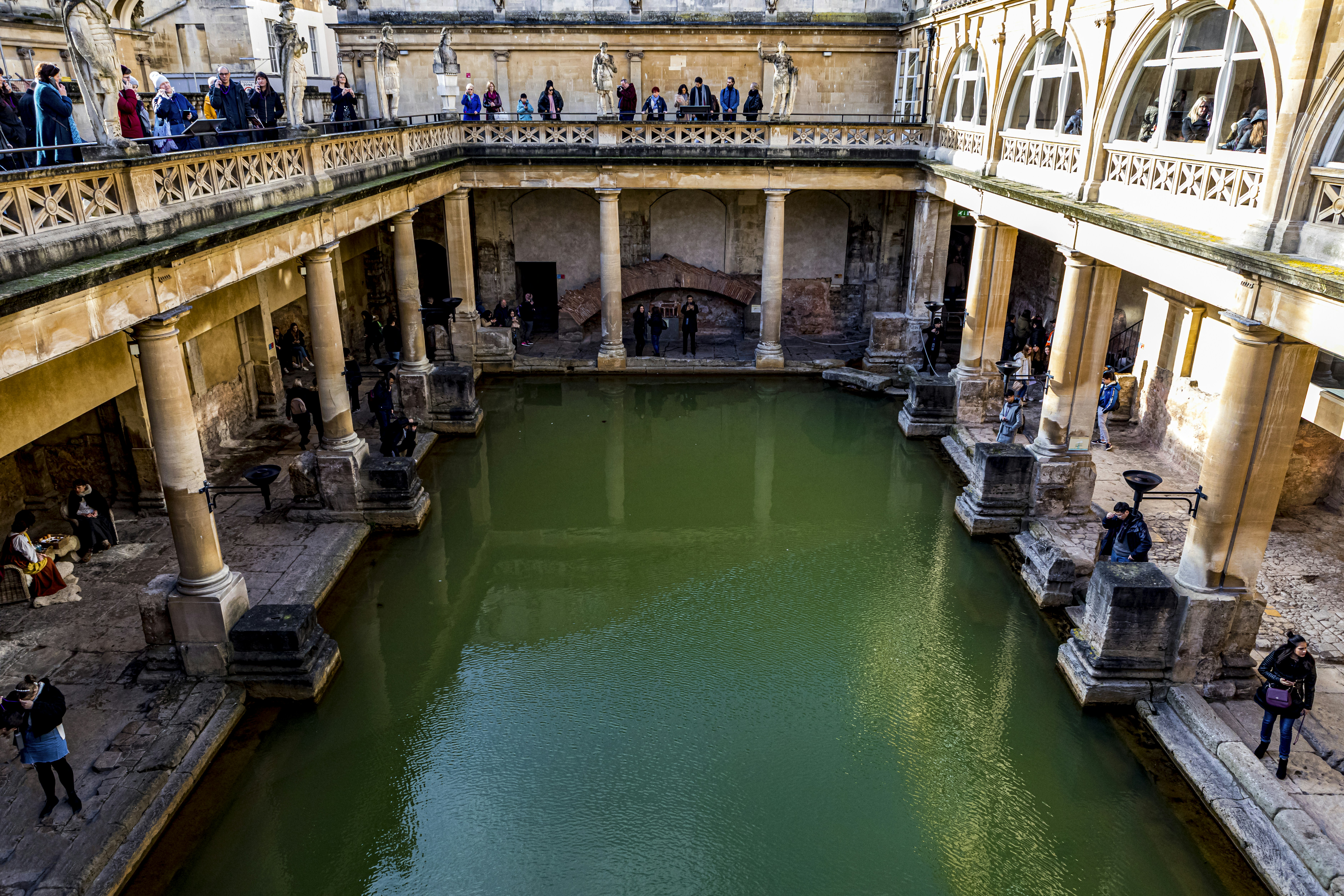 Antique historic landmark Roman Baths in Bath England UK, February 2020.