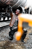 man in black leather jacket wearing helmet