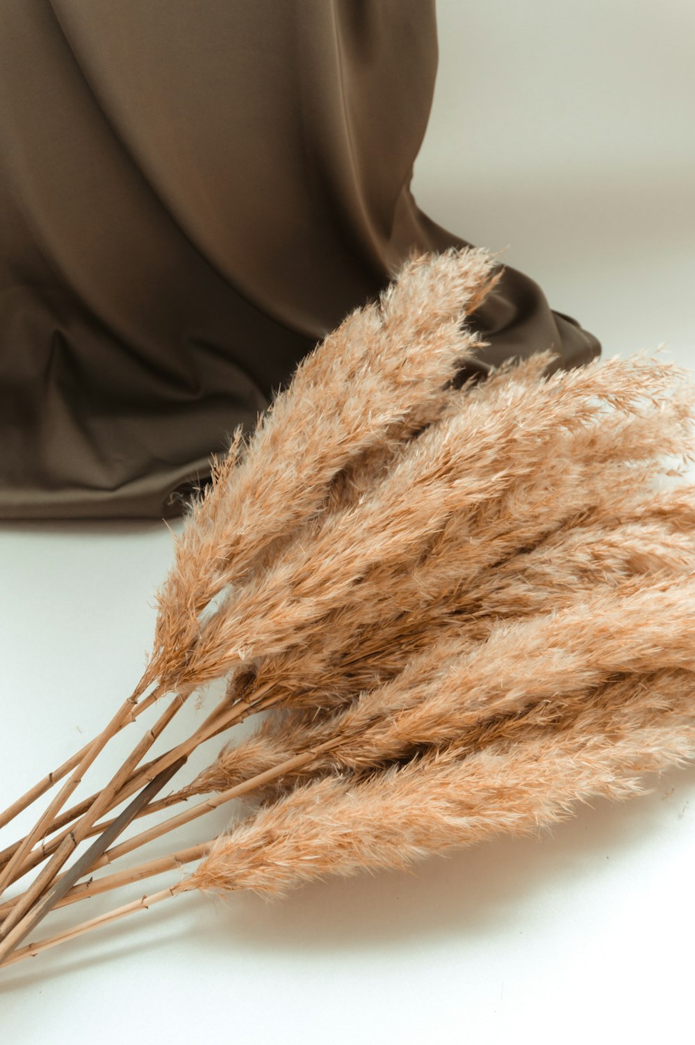 brown fur textile on black leather chair