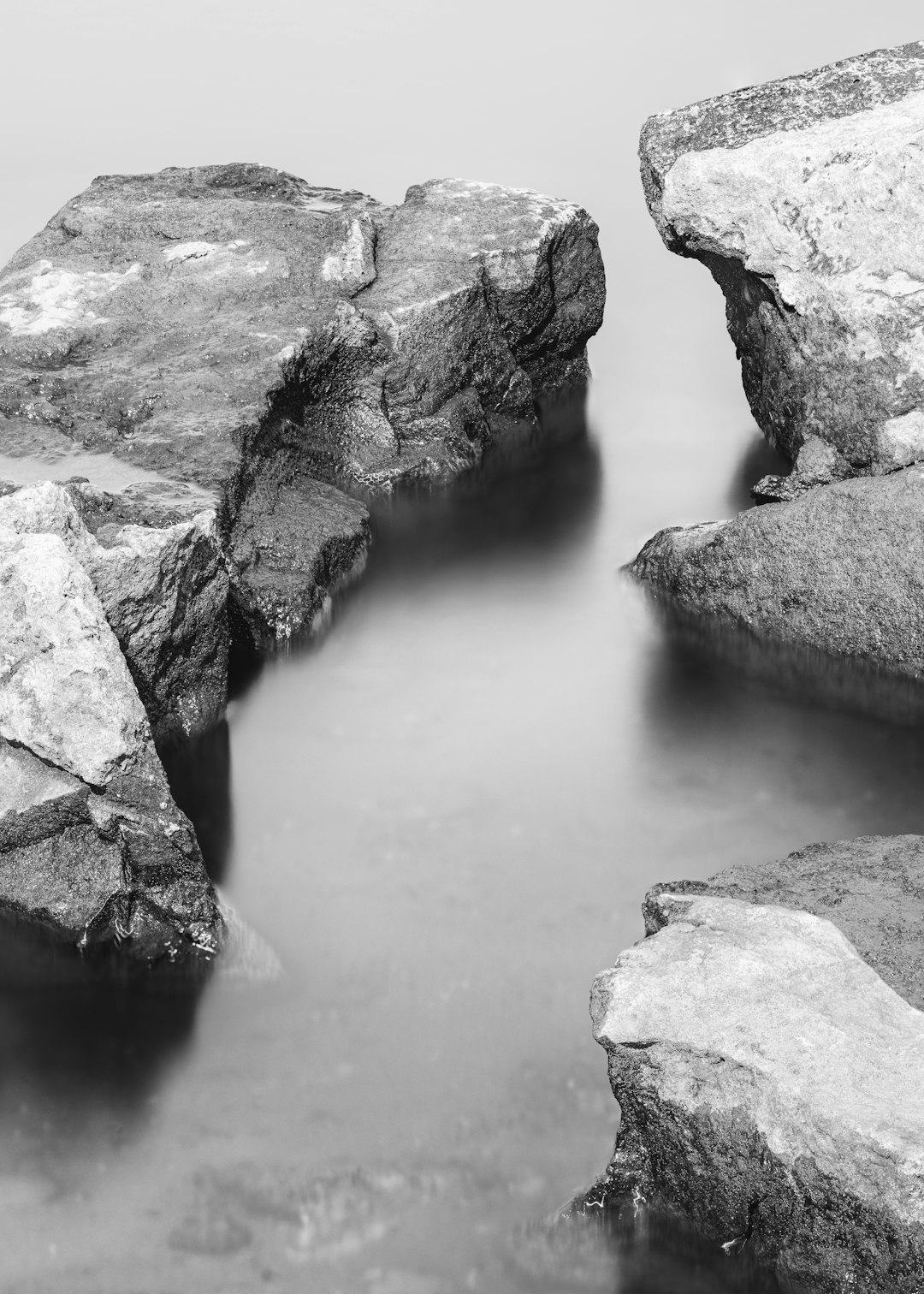 grayscale photo of rocky mountain