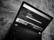 Screenshot of a sleek, dark-themed website homepage designed by blacktech