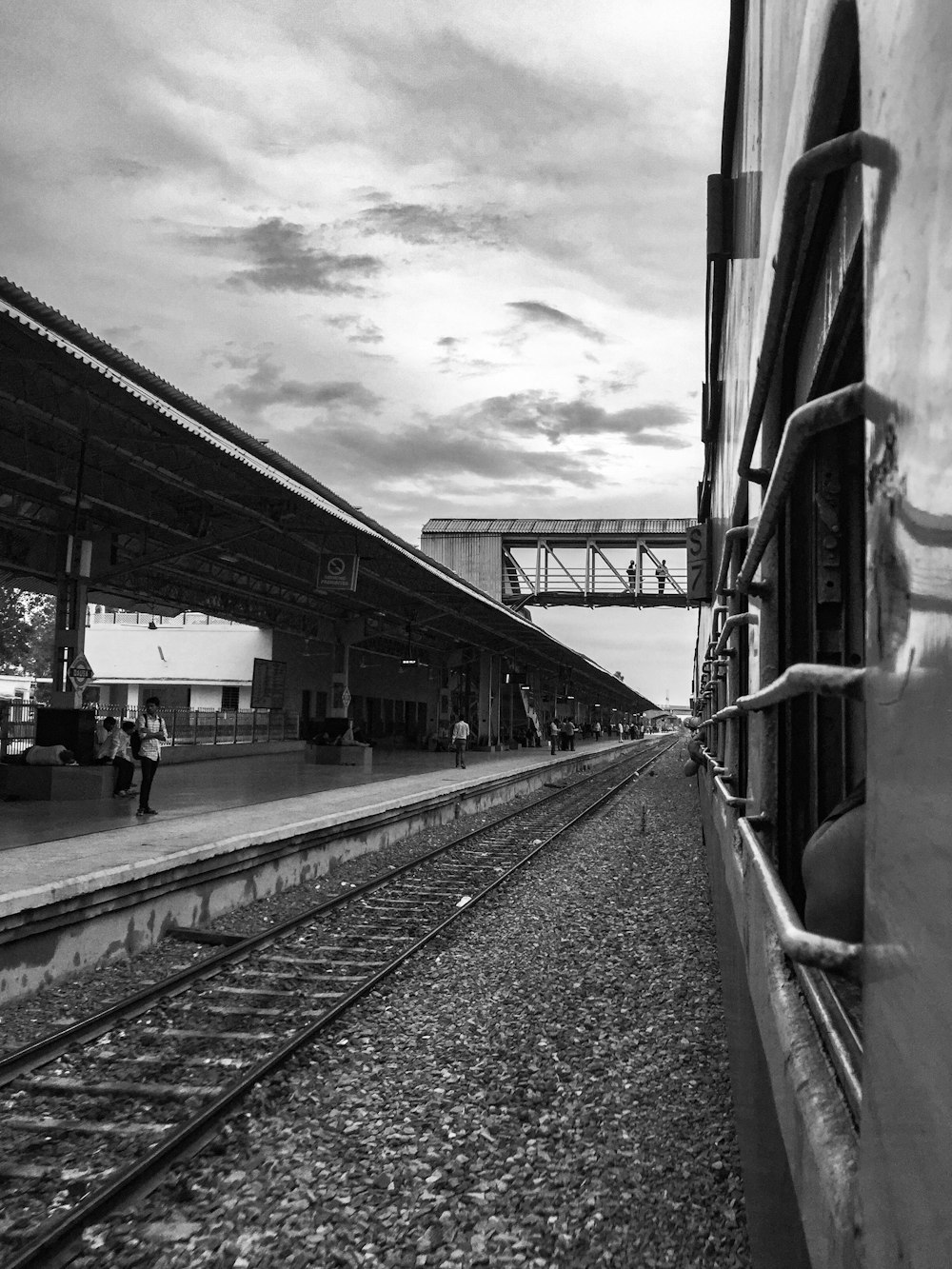 grayscale photo of train station