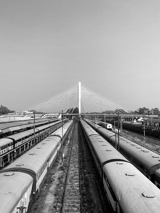 grayscale photo of train rail in Nagpur India