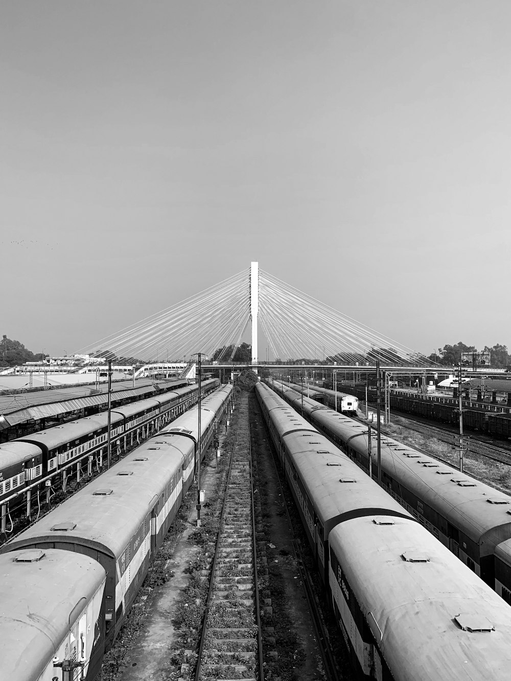 grayscale photo of train rail