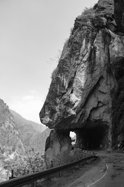 grayscale photo of rocky mountain