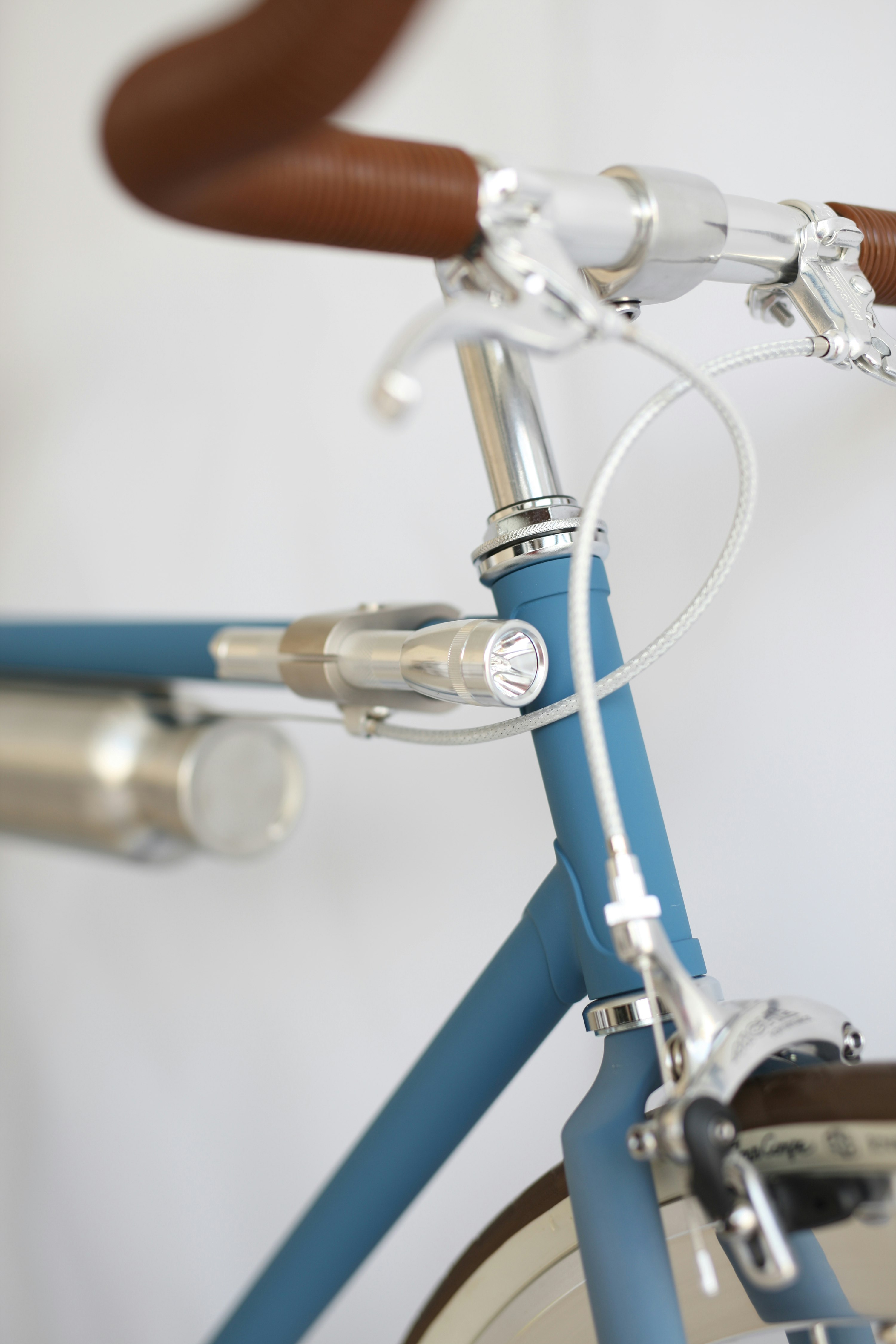 blue and silver bicycle handle bar