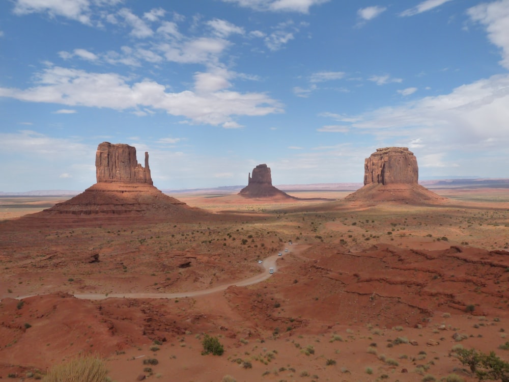 brown rock formation under blue sky during daytime