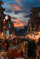 people walking on street during night time