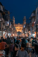 people walking on street during night time
