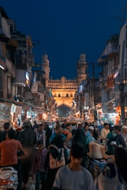 people walking on street during night time