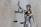 woman holding sword statue during daytime