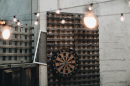 black and white analog clock at 11 00