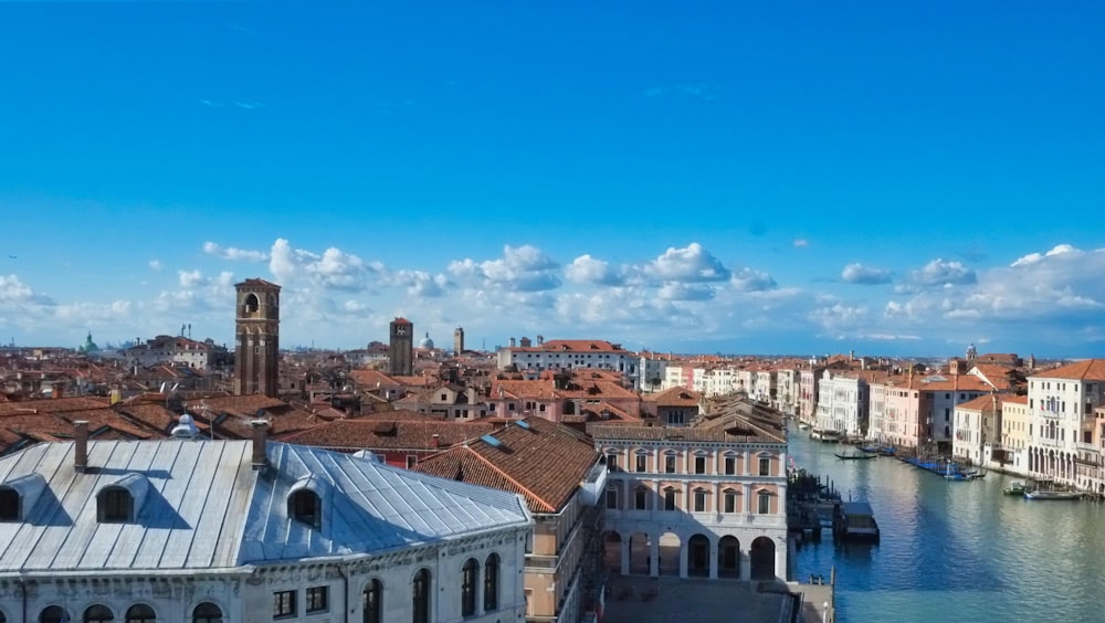 white and brown concrete buildings under blue sky during daytime