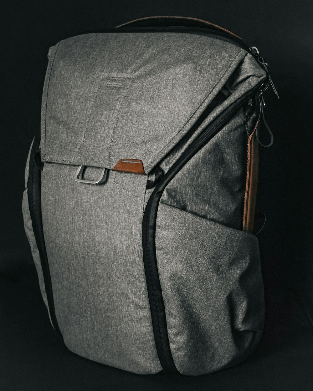 gray and black sling bag