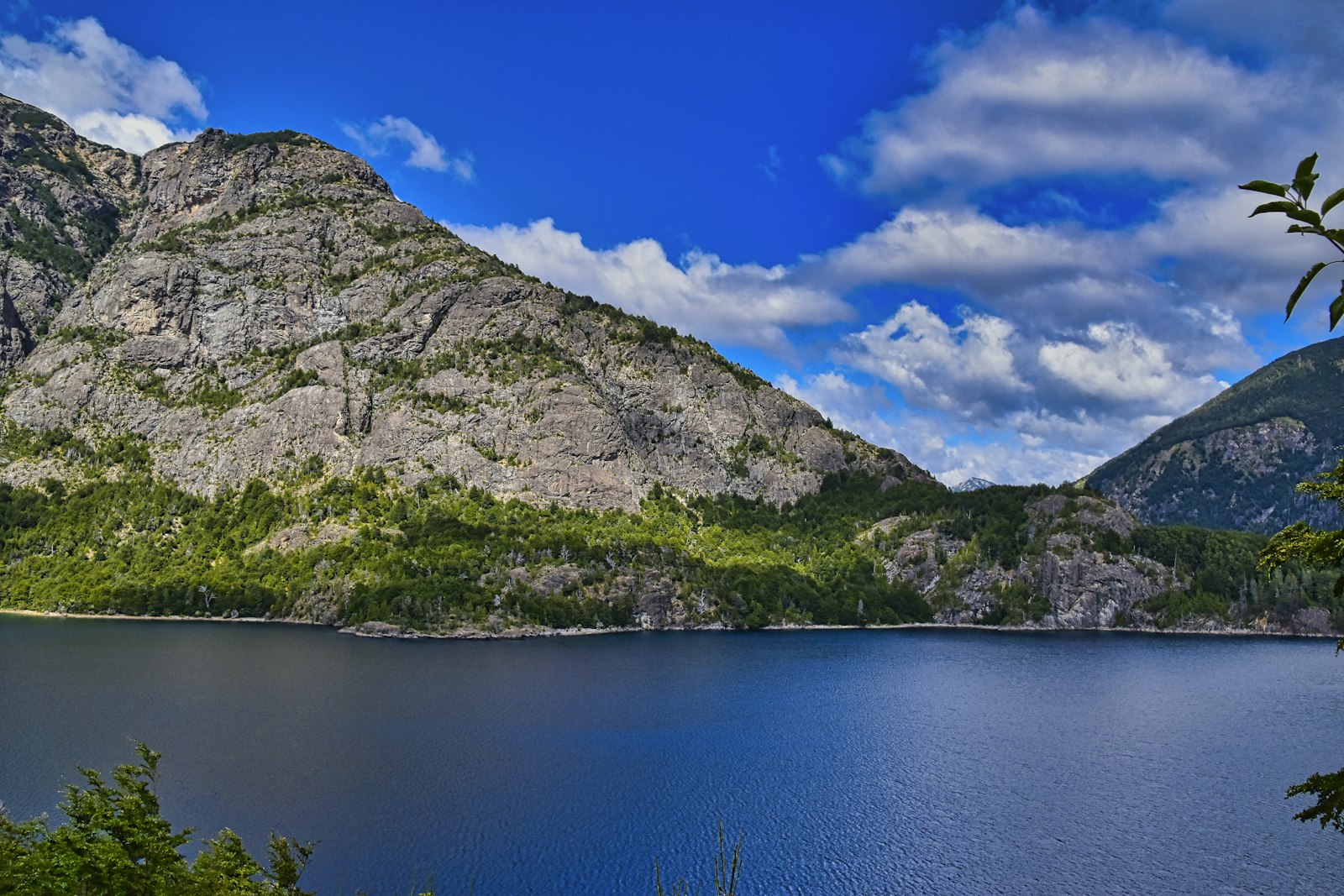 Blue waters of Nahuel Huapi beneath granite peaks — Bariloche's alpine lake district