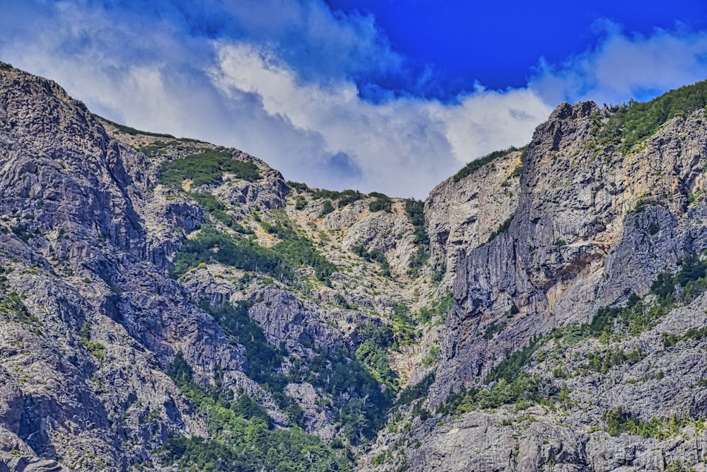 green and brown mountain under blue sky during daytime