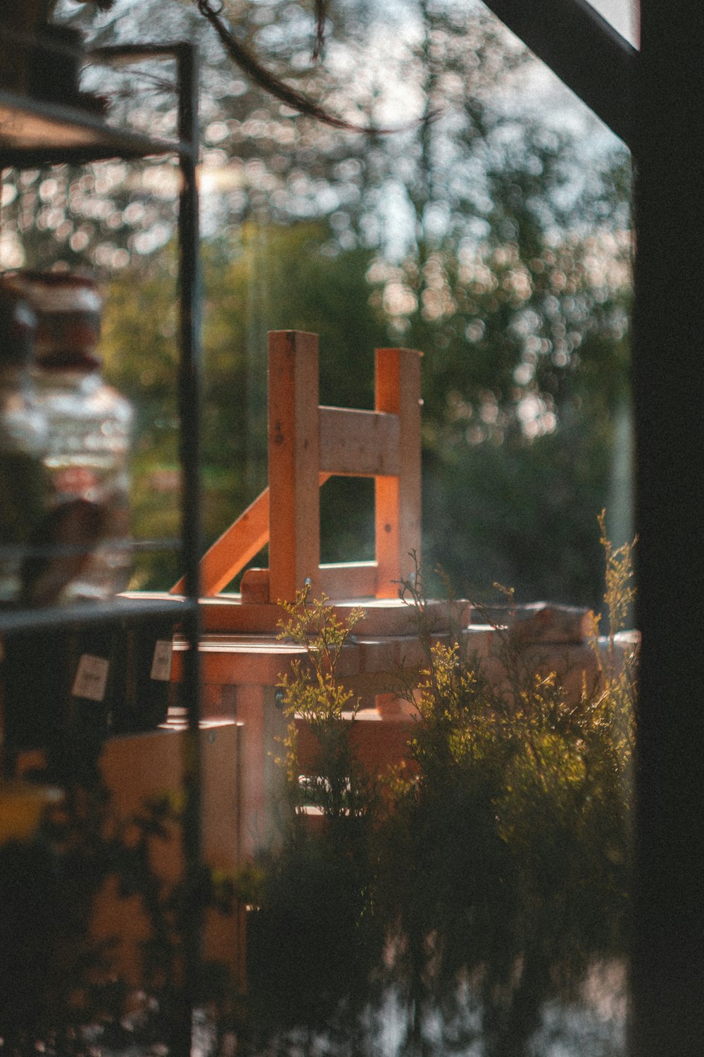 brown wooden ladder near green trees during daytime