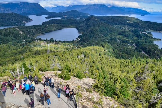 people hiking on mountain during daytime in Parque Nacional Nahuel Huapi Argentina