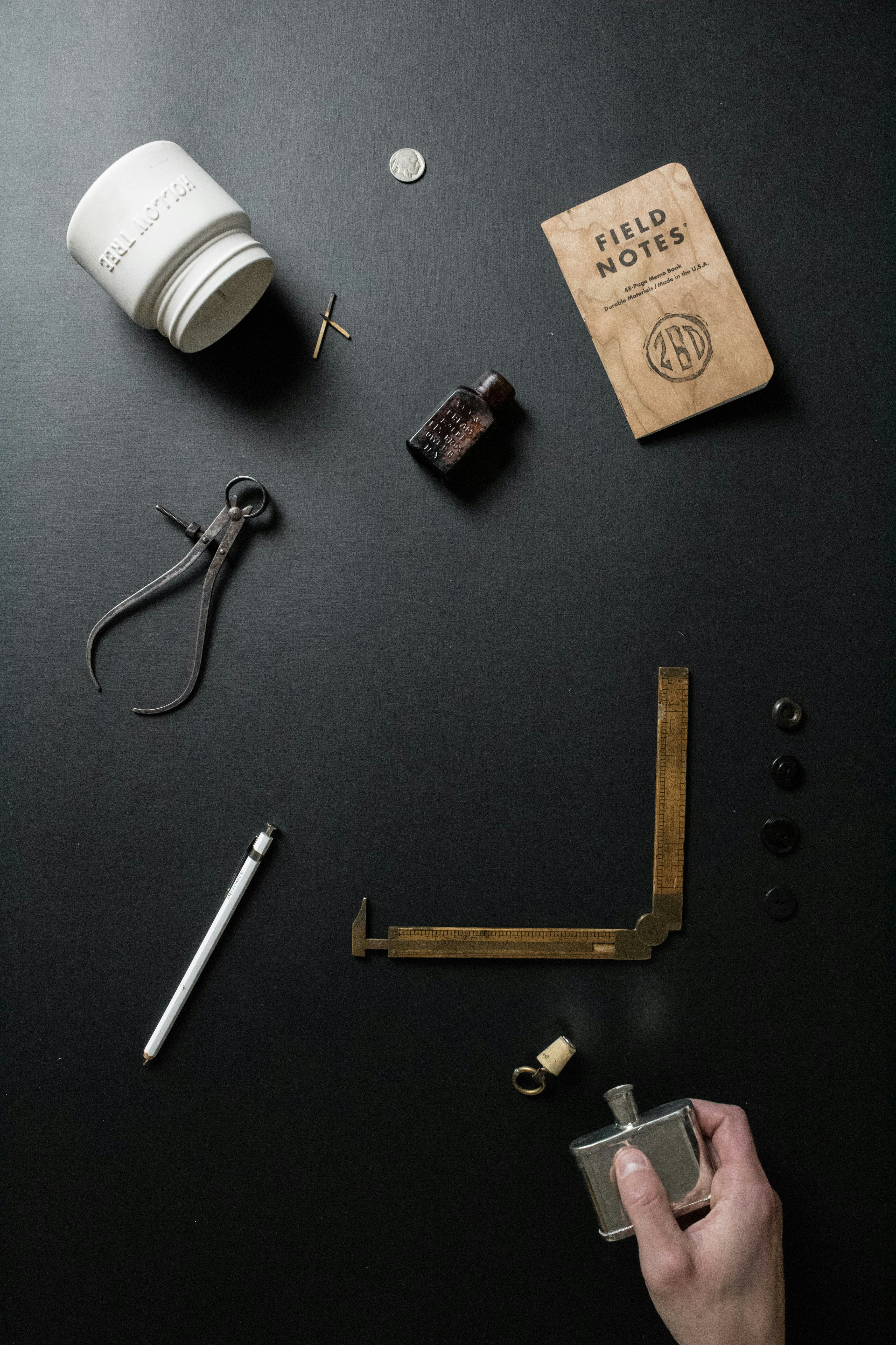 black and brown metal tool