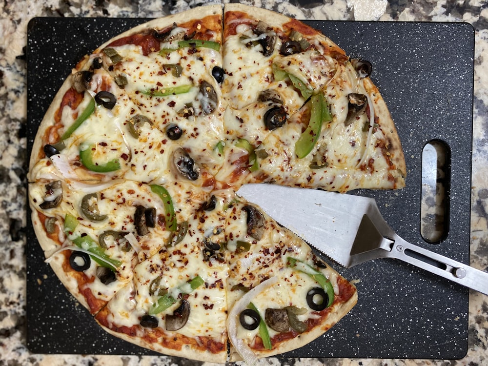 pizza with green and red bell pepper and cheese