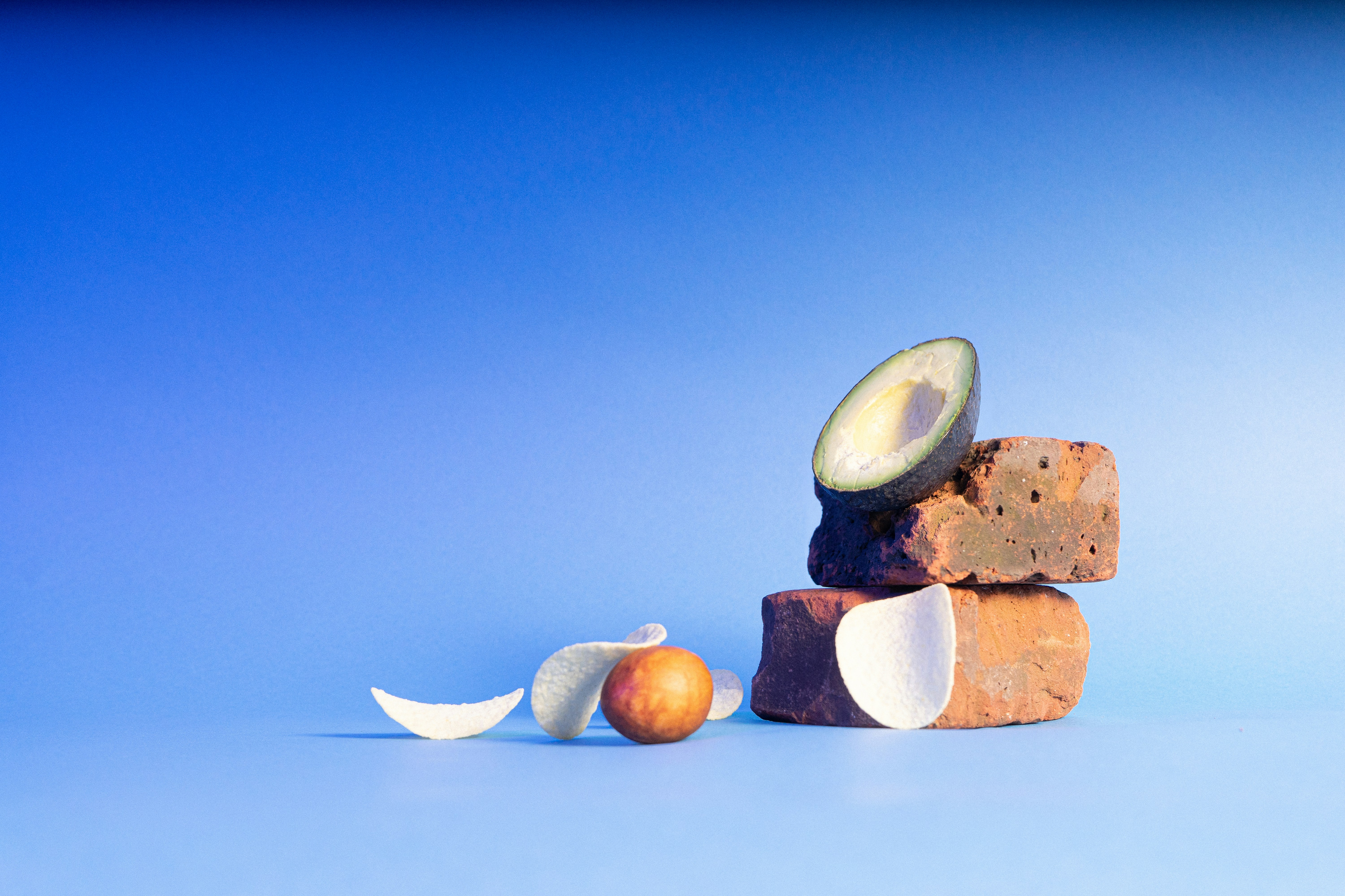 brown and white stones with blue background