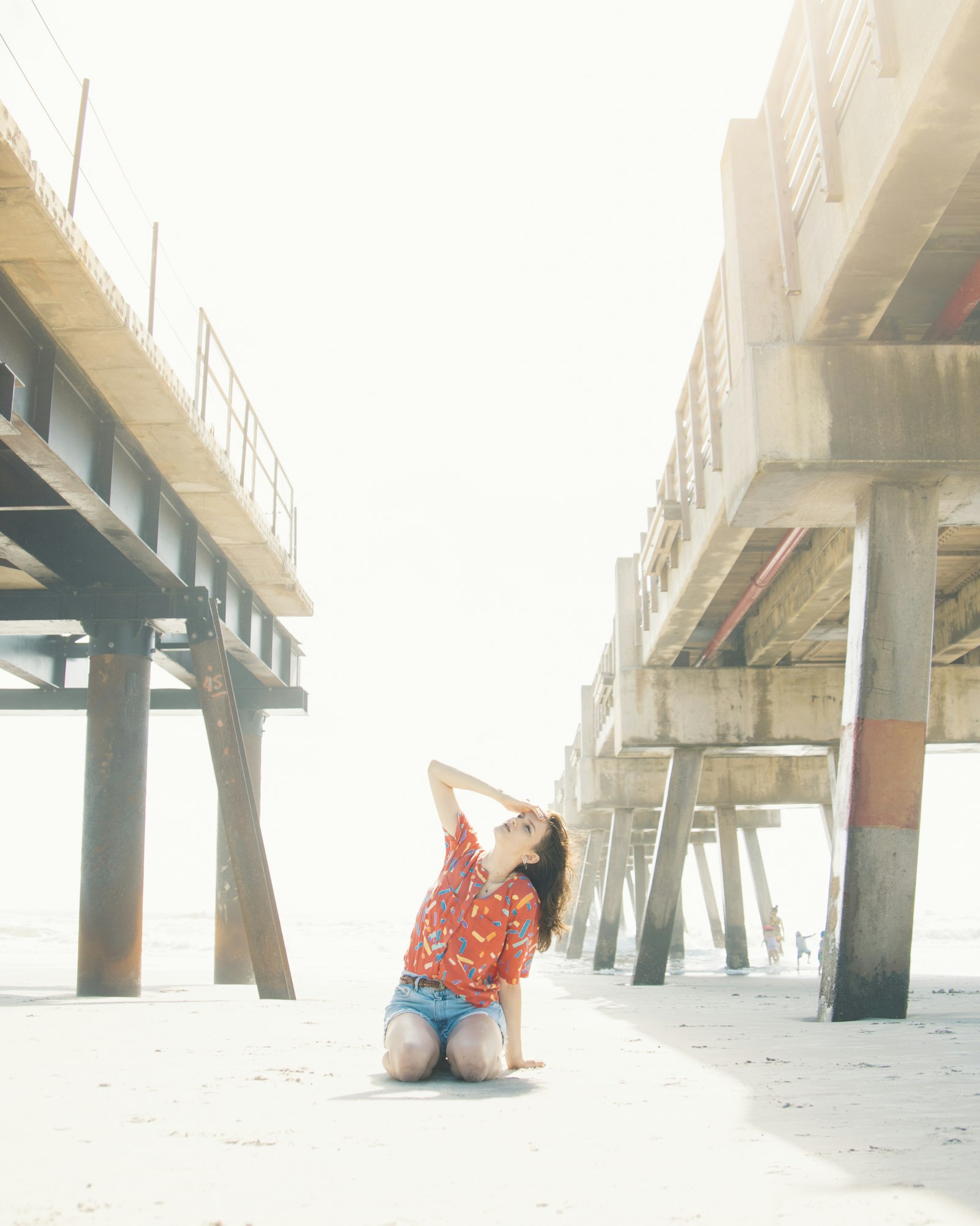 Canon EOS RP + Canon RF 24-240mm F4-6.3 IS USM sample photo. Woman in red and photography