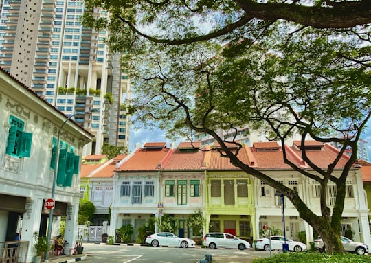 cars parked in front of brown concrete building during daytime in Kampong Bahru Road Singapore