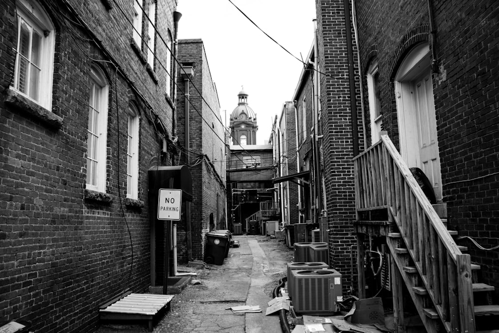 grayscale photo of brick building