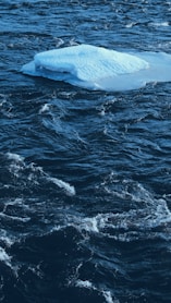 white and blue ocean waves