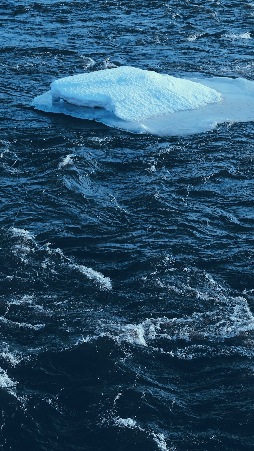 white and blue ocean waves