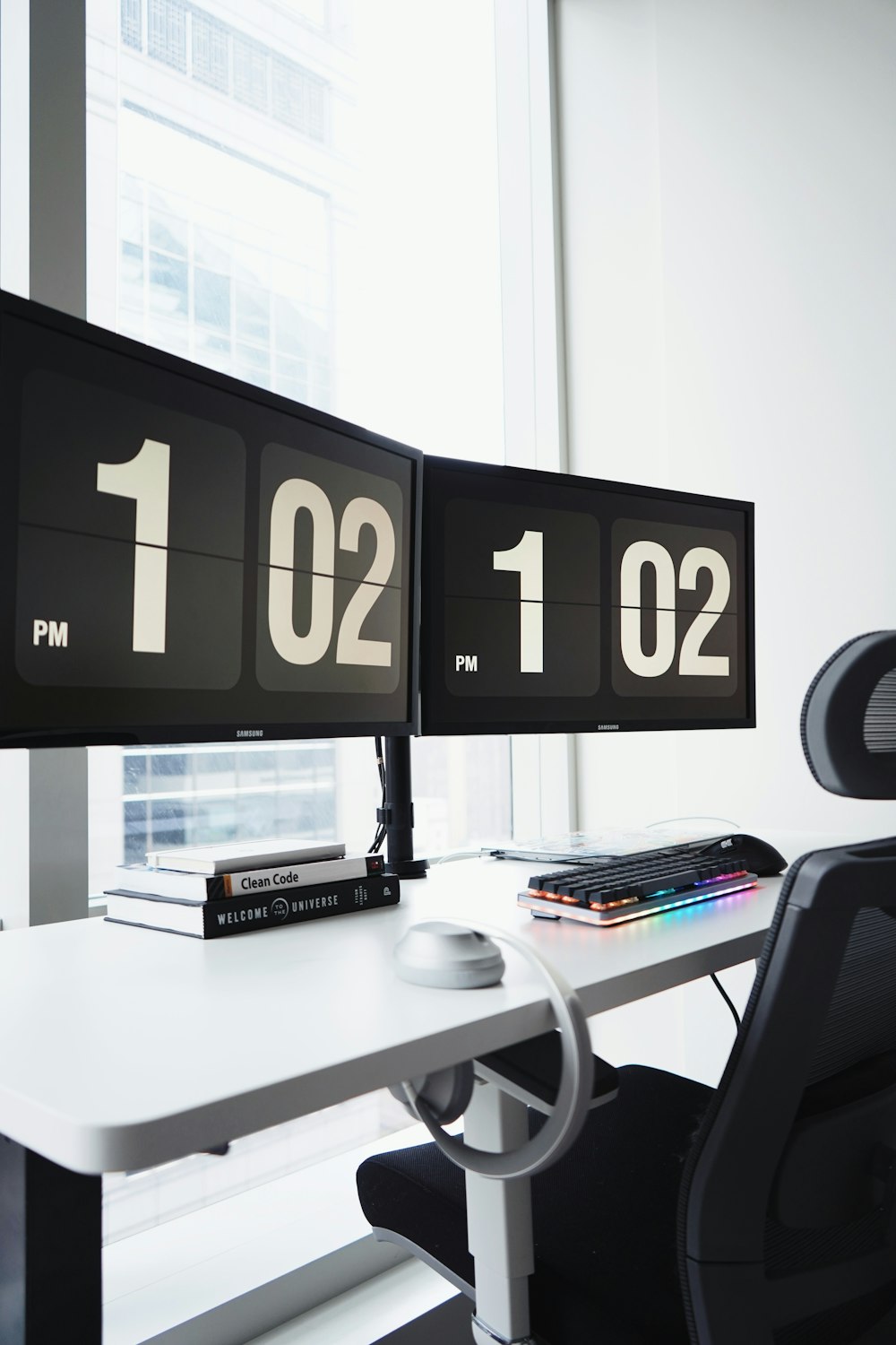 black flat screen tv on white wooden table