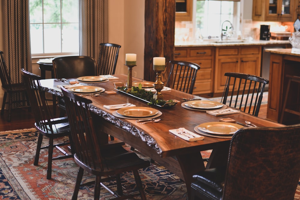 brown wooden table with chairs