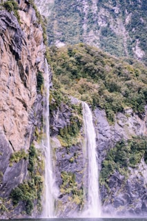 A stunning waterfall cascading into a rocky gorge.