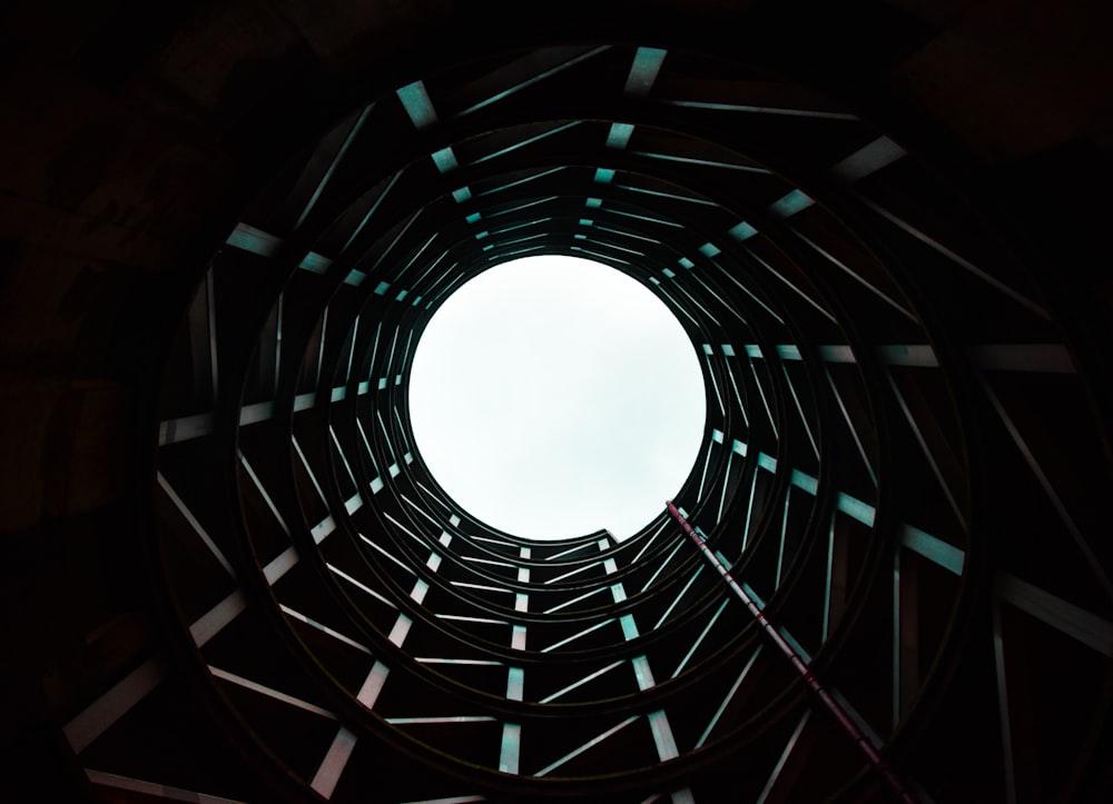 brown wooden tunnel with white light