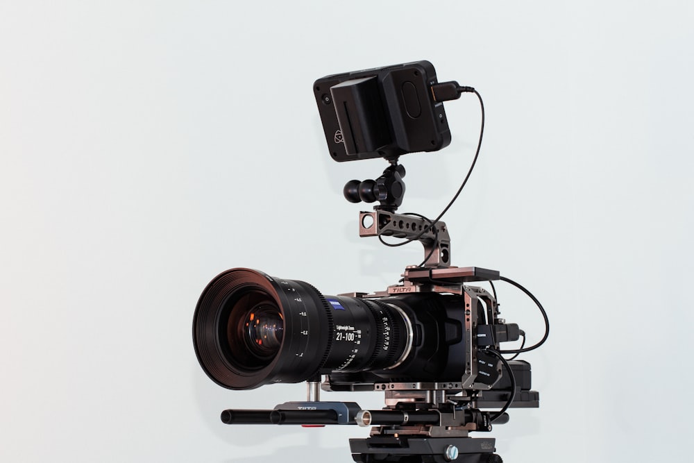 black dslr camera on white table