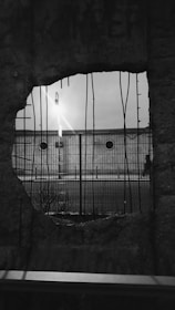 Image showing careful core drilling in a concrete wall inside a renovation site.