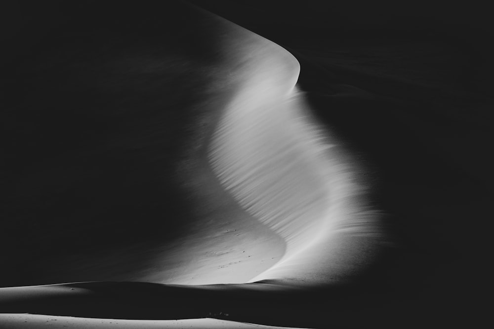 grayscale photo of water wave