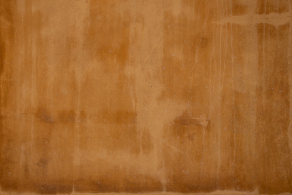 brown wooden floor with white textile