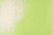 White rice grains are scattered over a bright green background, creating a contrast between the textures and colors.