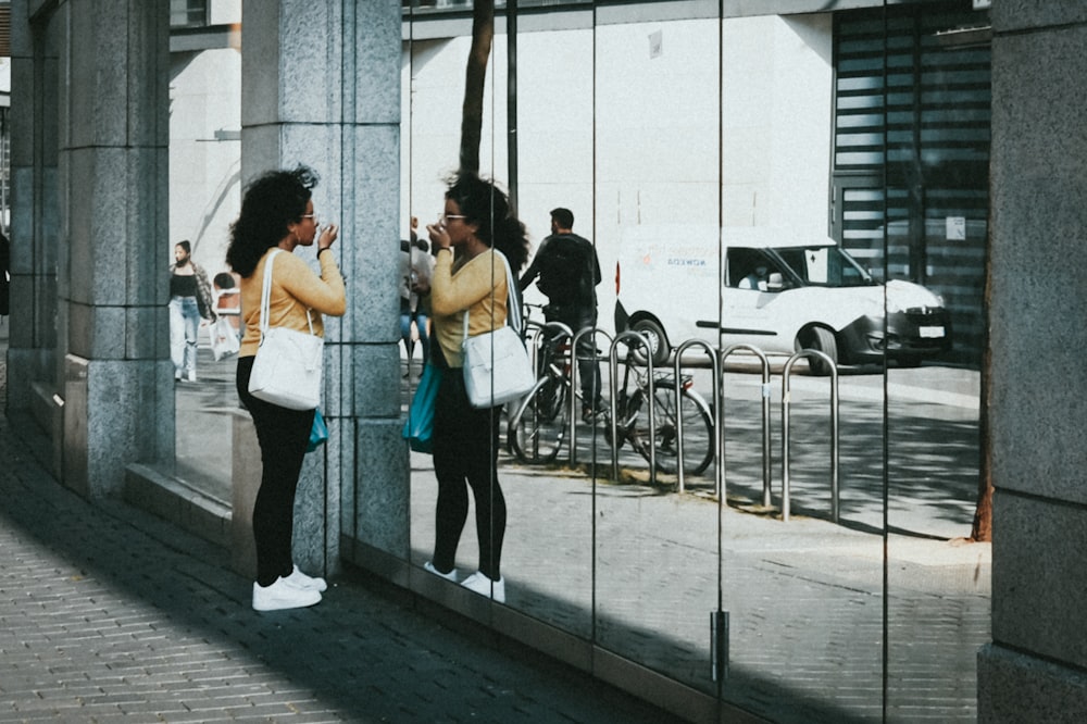 a couple of women standing next to each other