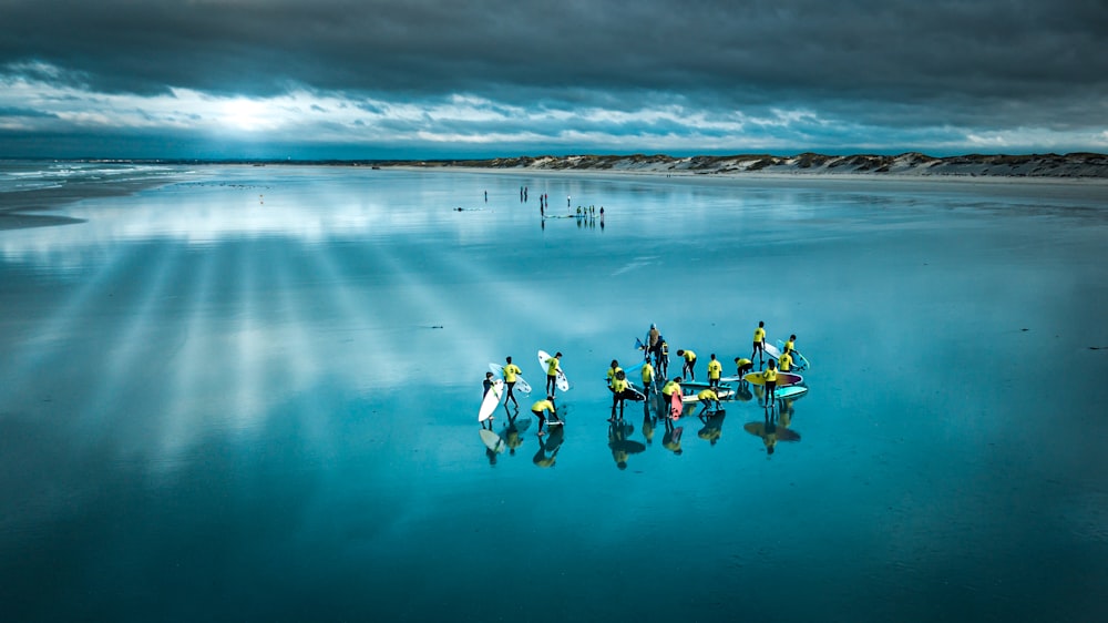 people in body of water during daytime