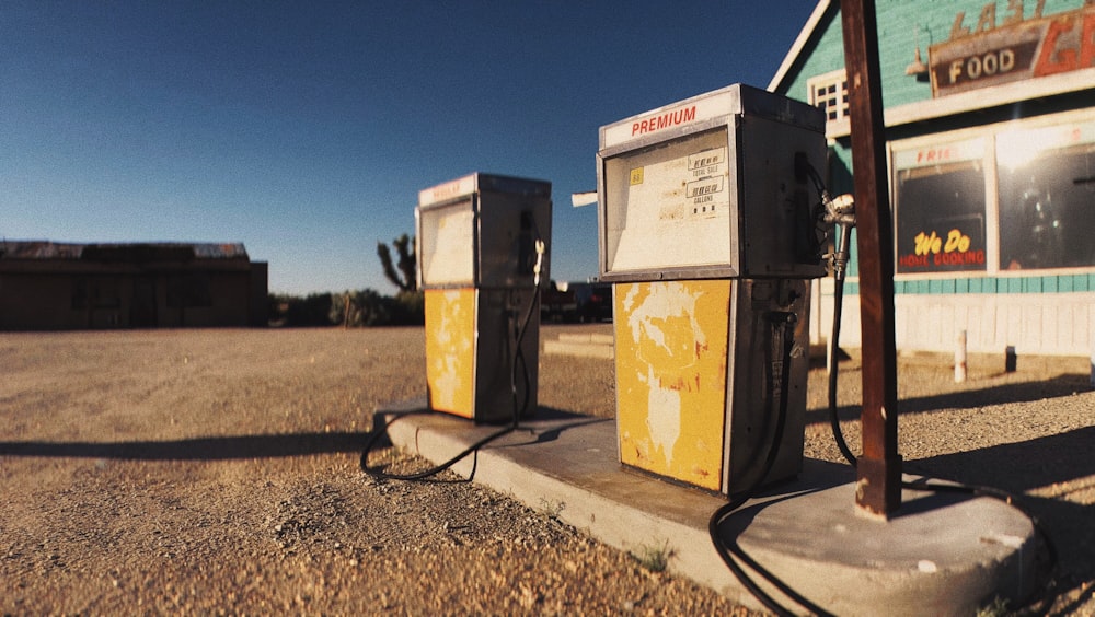 2 yellow and black gas dispenser