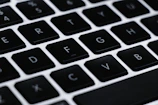 Visual keyboard highlighting home row keys during a beginner lesson.